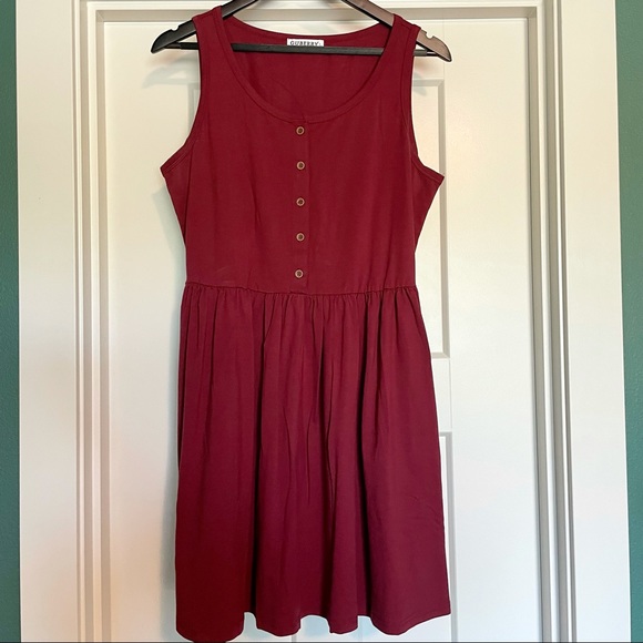 Guberry Dresses & Skirts - Burgundy sleeveless dress w/ pockets and functional buttons. Size Large